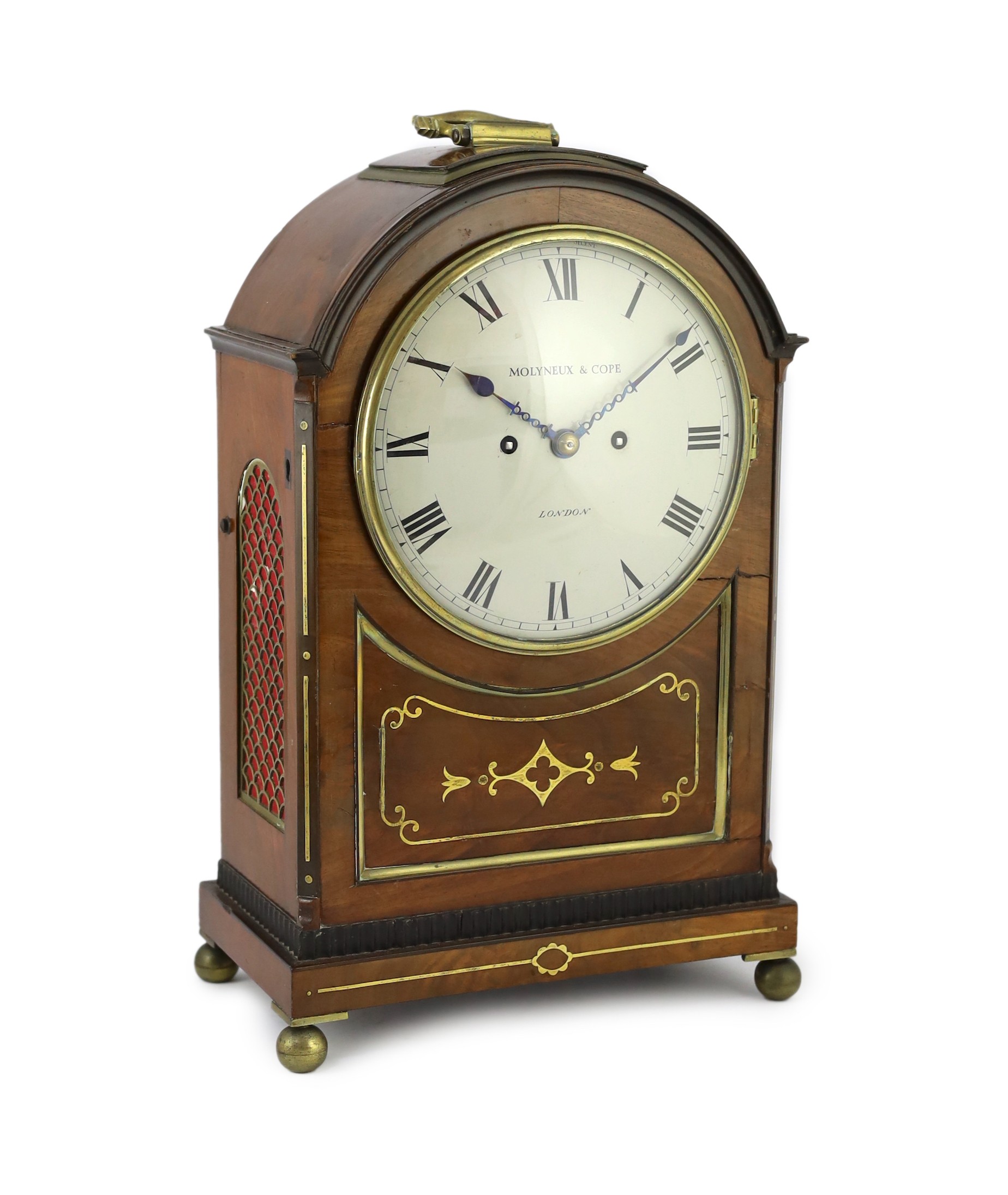 Molyneux & Cope of London. A Regency brass inset repeating bracket clock, 30cm wide 17cm deep 46cm high